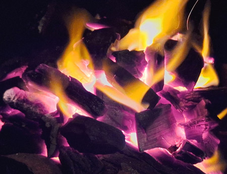 burning lump charcoal